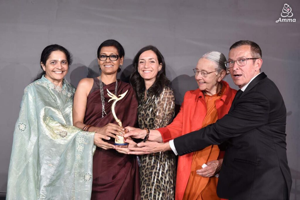 a group of people with an award