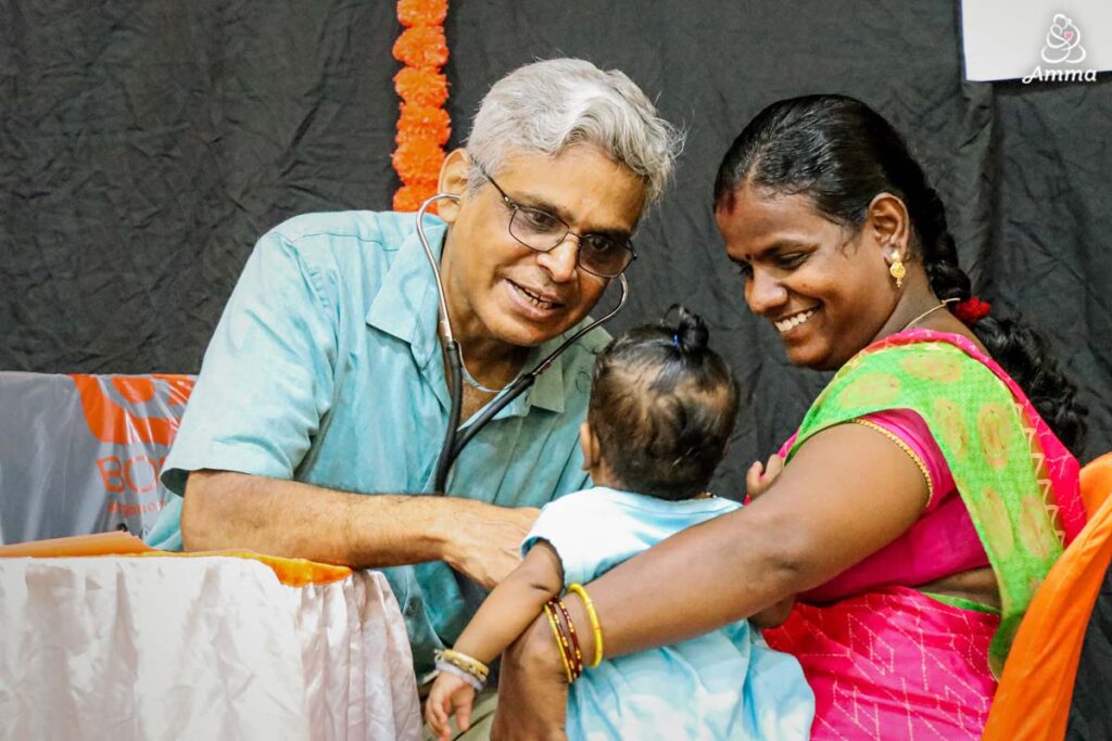 a doctor checks a baby