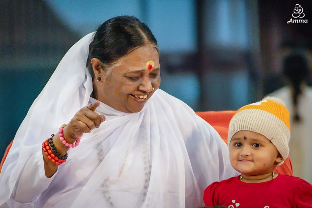 Amma with a child