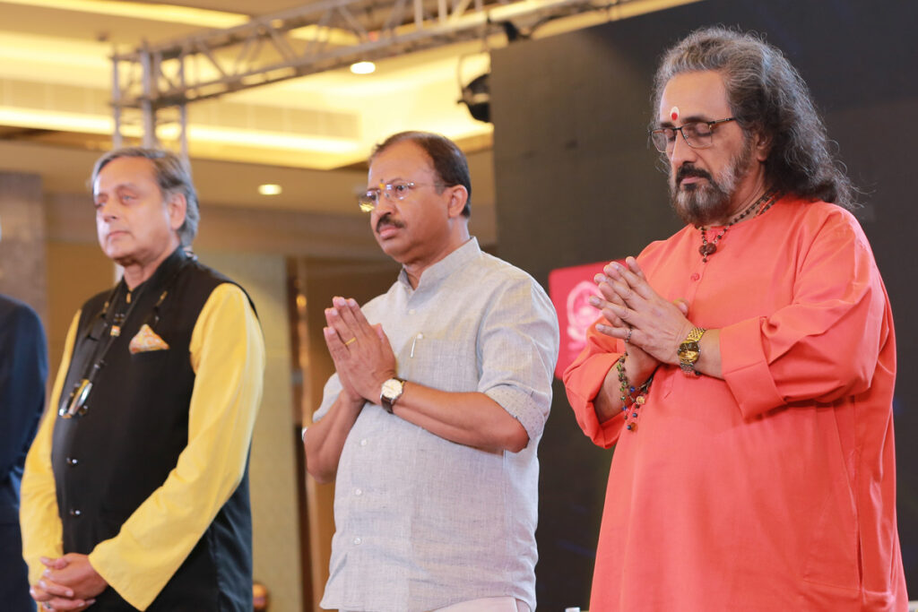 Dr Shashi Tharoor, Sri V Muraleedharan, and Swami Amritaswarupananda Puri.