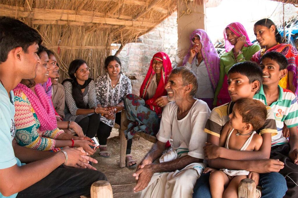 students with villagers