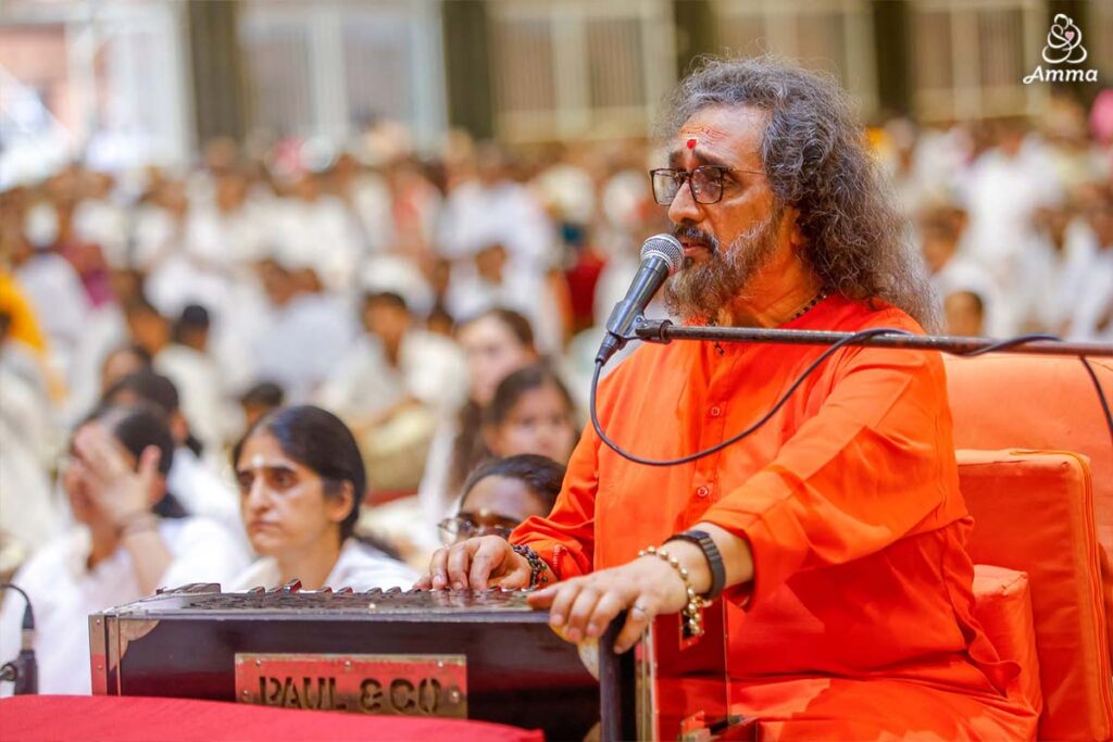 a swami fervently sings