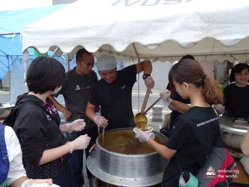 Volunteers serve soup