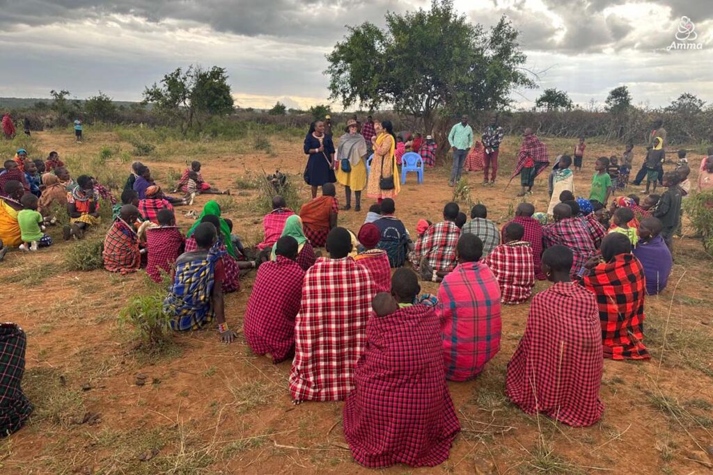 a community of villagers meets in a field