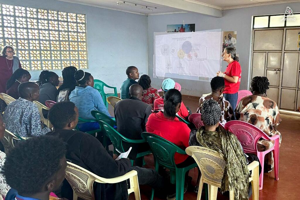 a woman addresses a class