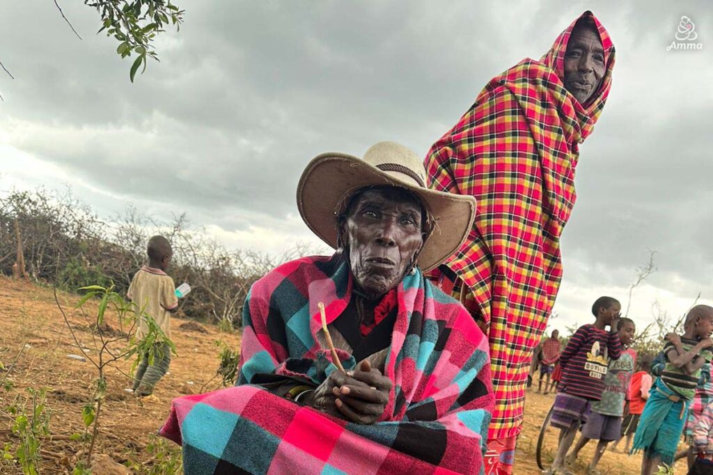 Two tribal men pose for a portrait