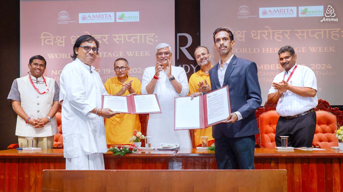 Men holding the signed agreement