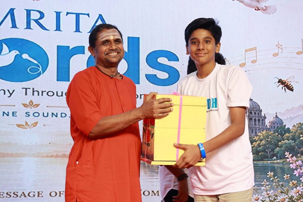 a swami gives a bee box to a young man