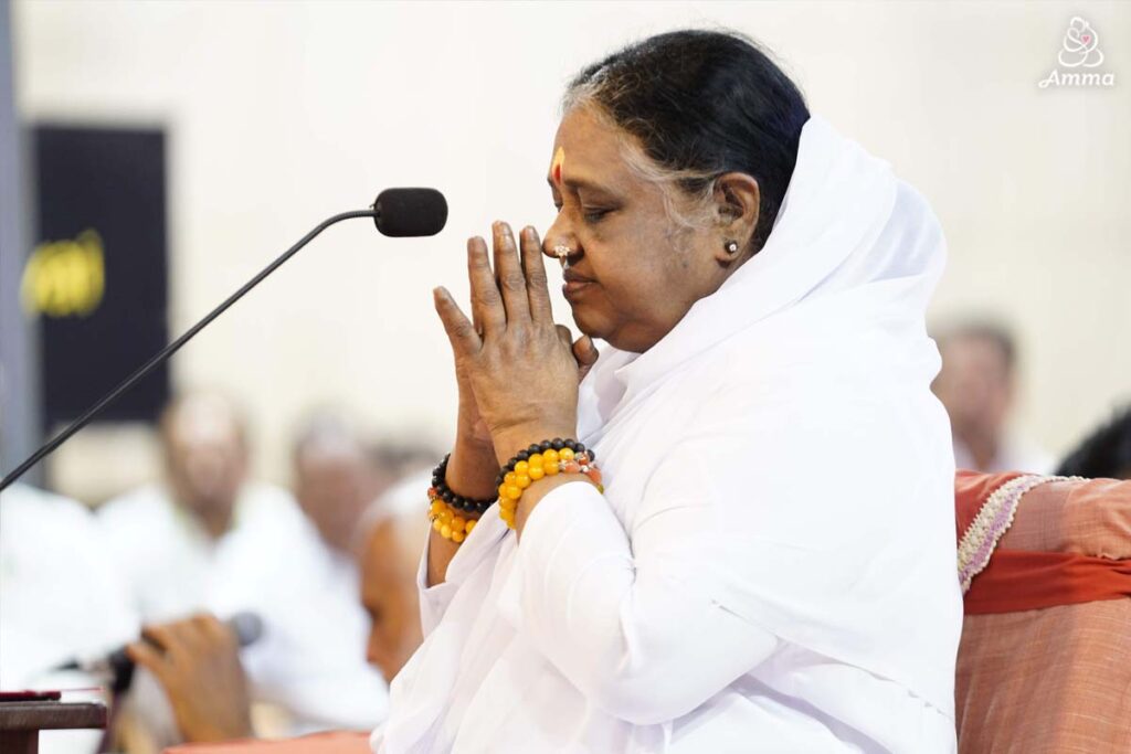 Amma praying