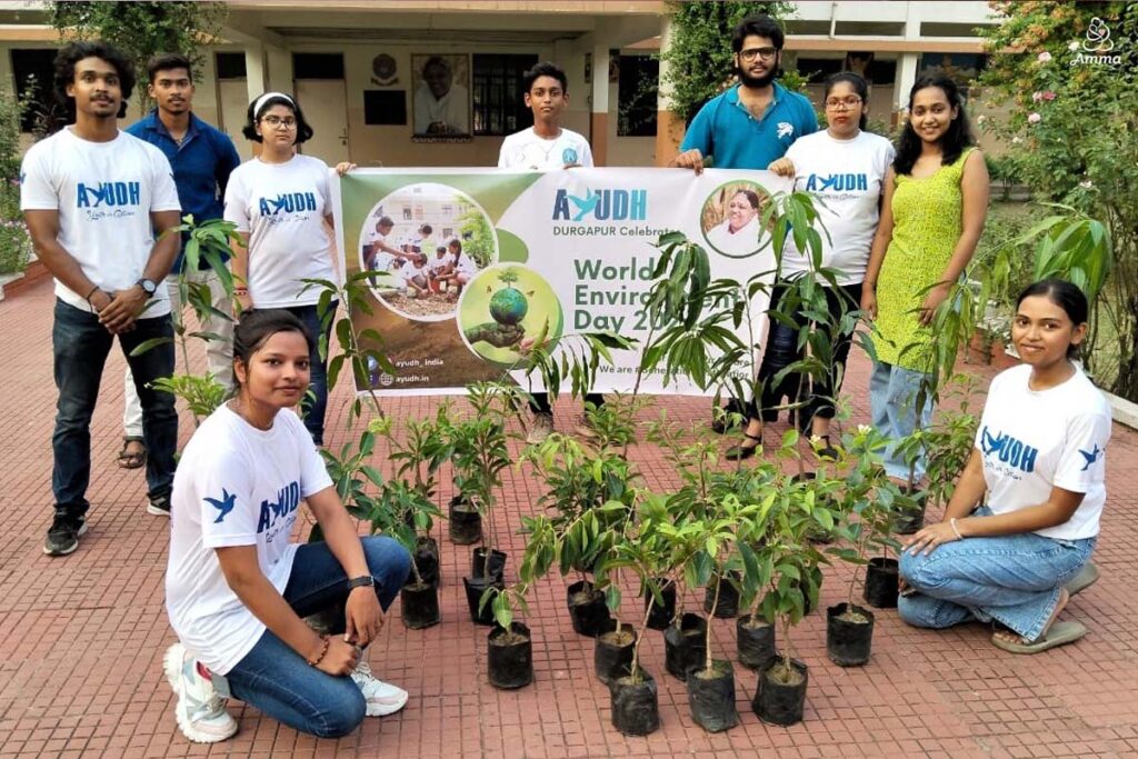 youth with saplings