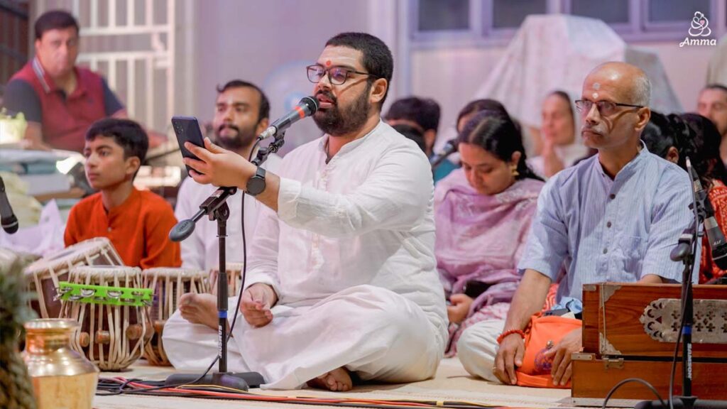 A brahmachari sings bhajans