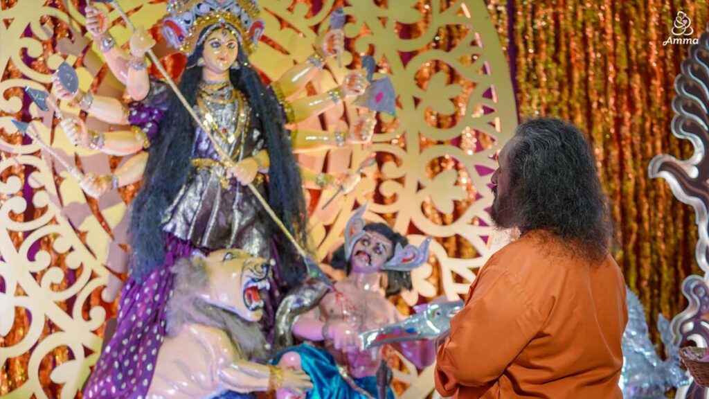 A Swami prays to Durga Devi