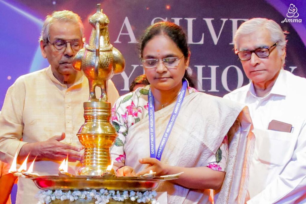 A woman lights a flame