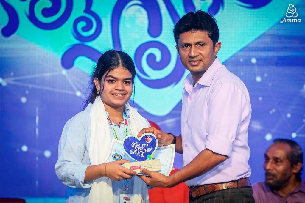 a young woman receives an award