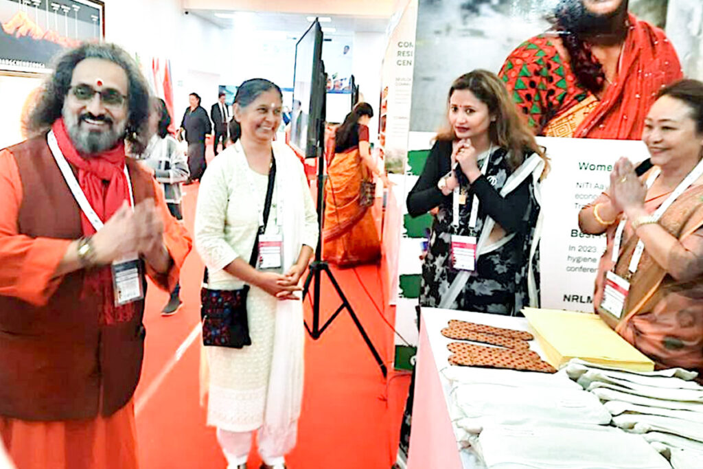 Swami Amritaswarupananda Puri at the stall for Saukhyam