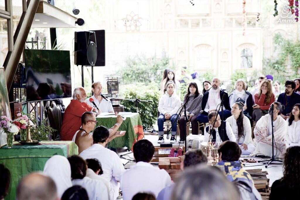 People listen to a spiritual talk