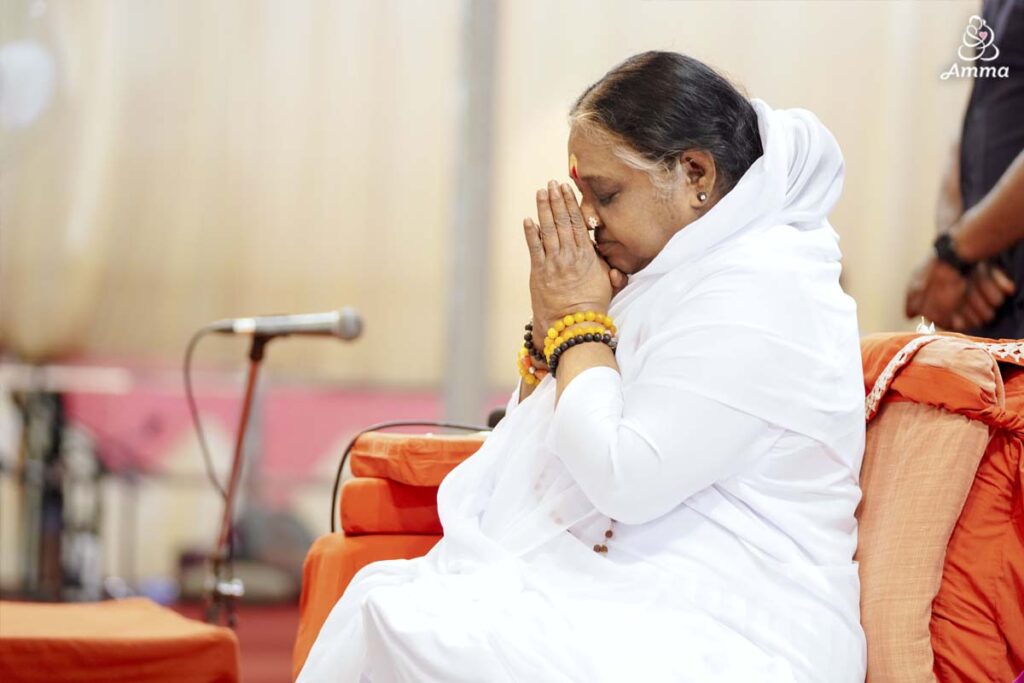 Amma in prayer