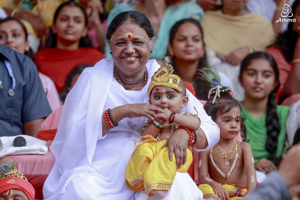 Amma with a child