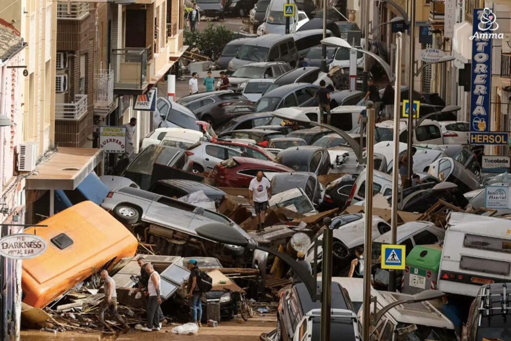 a street filled with piled up cars