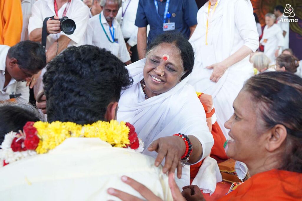 Amma giving darshan