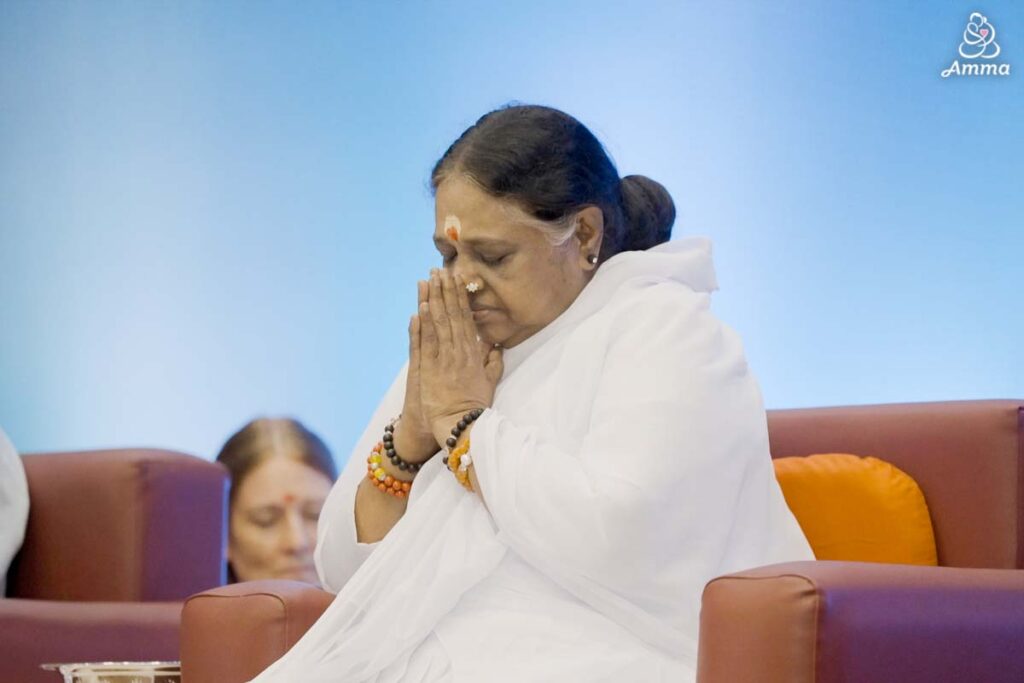 Amma in prayer