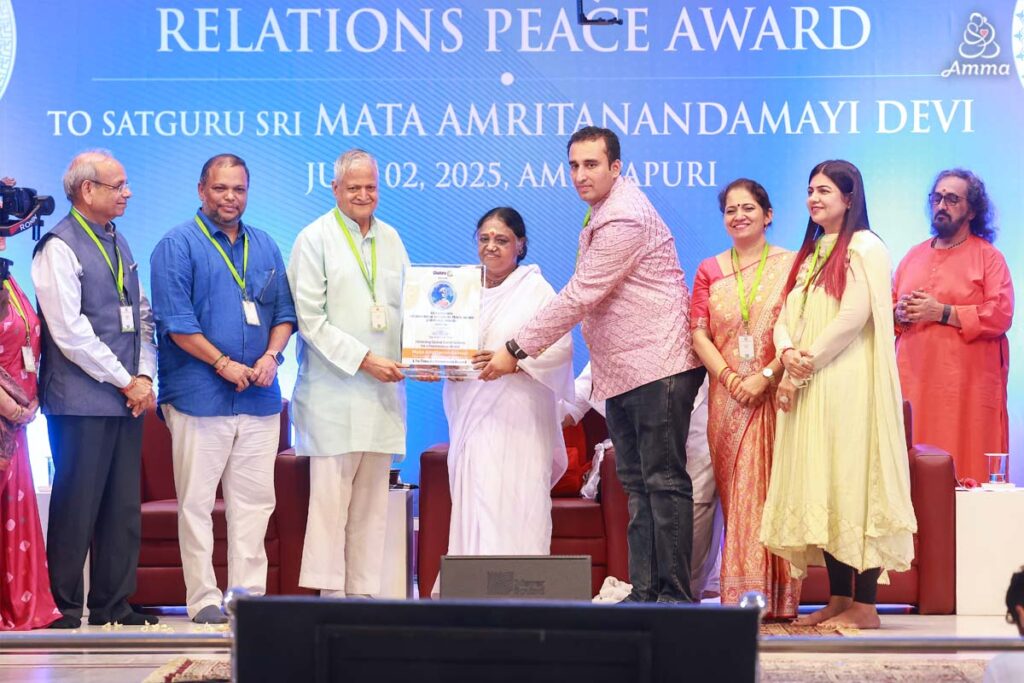 group with Amma and the award